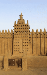 FILE- The world's largest mud-brick building, the Great Mosque of Djenne, Mali, awaits its annual replastering, May 10, 2024. 