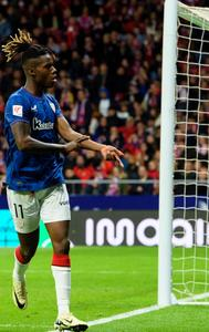 Nico Williams points to his colour of skin after scoring against Atletico Madrid amidst racist chants 