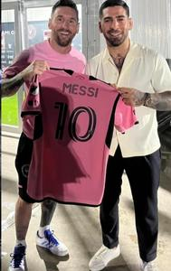 Lionel Messi and Ilia Topuria