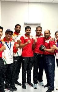 India's Abhishek Yadav with his team