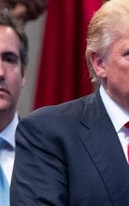 FILE- Donald Trump, right, and attorney Michael Cohen, left, during a visit to the Pastors Leadership Conference at New Spirit Revival Center, Sept. 21, 2016, in Cleveland.  