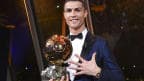 Cristiano Ronaldo with his Ballon d'Or