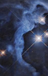 Nasa’s Hubble Telescope Captures Triple-Star Family Bathed In Nebula 