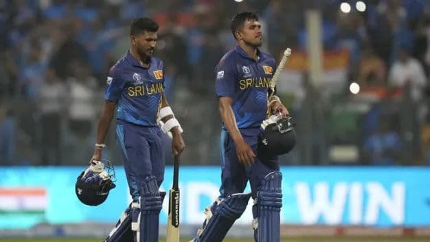 Sri Lanka cricket team players walk back to the dressing room after disappointing loss against India