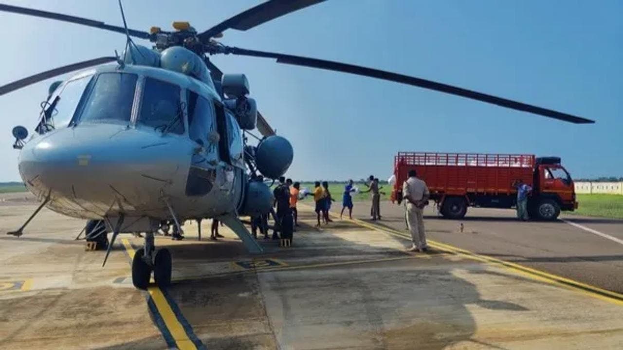 A Mi-17V5 helicopter of the Indian Air Force sits on the tarmac ahead of its participation in the relief operation.