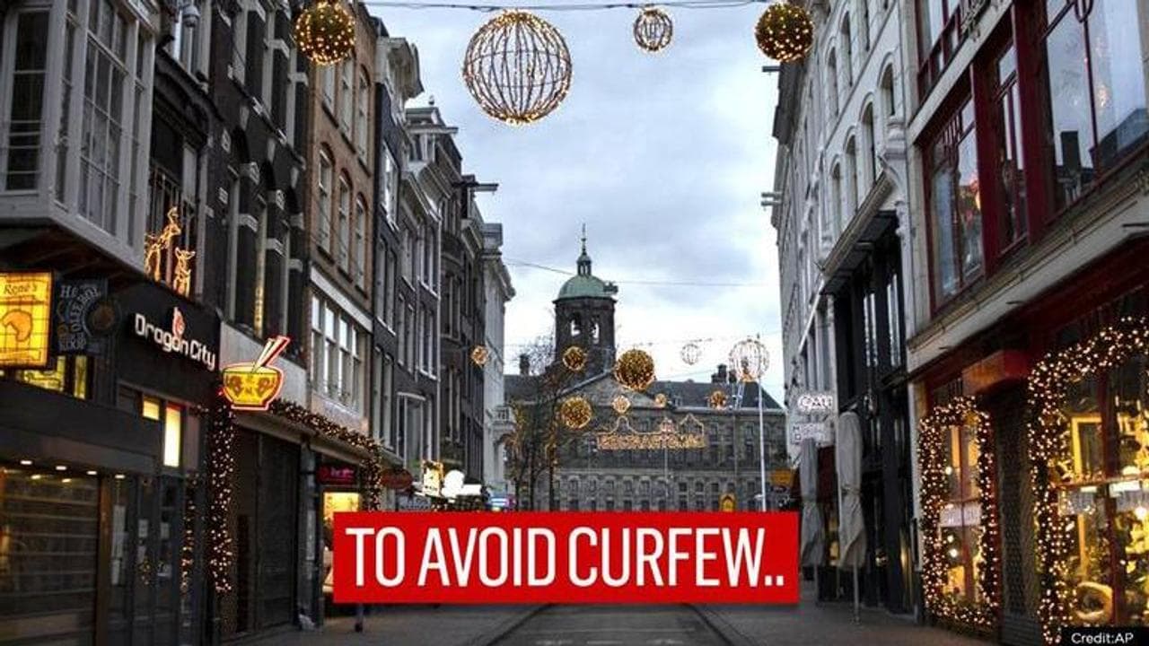 Dutch residents borrow dogs, buy delivery uniform as authorities impose COVID-19 curfew
