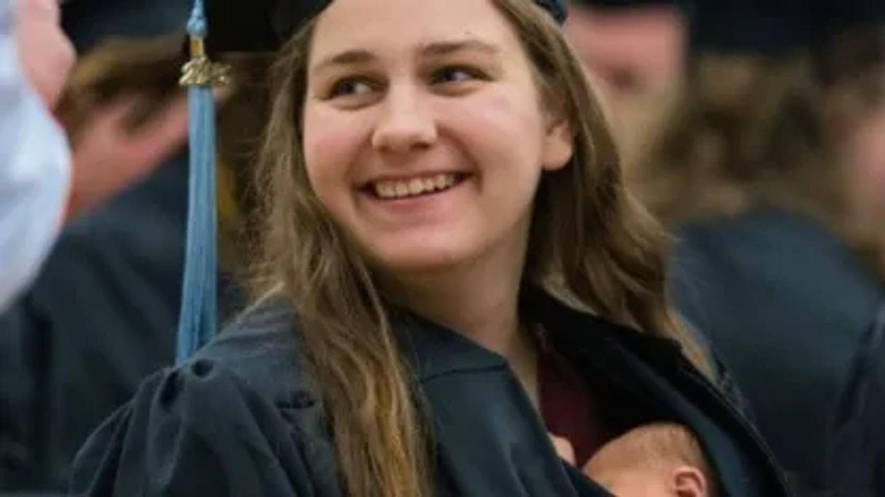 Michigan woman recieves degree with newborn baby tucked inside the graduation gown