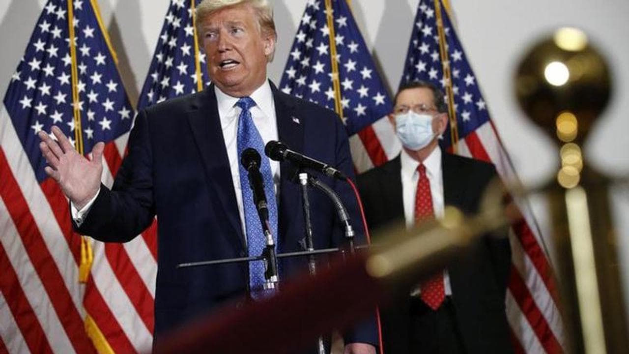 Trump could violate Ford face mask requirement on plant tour