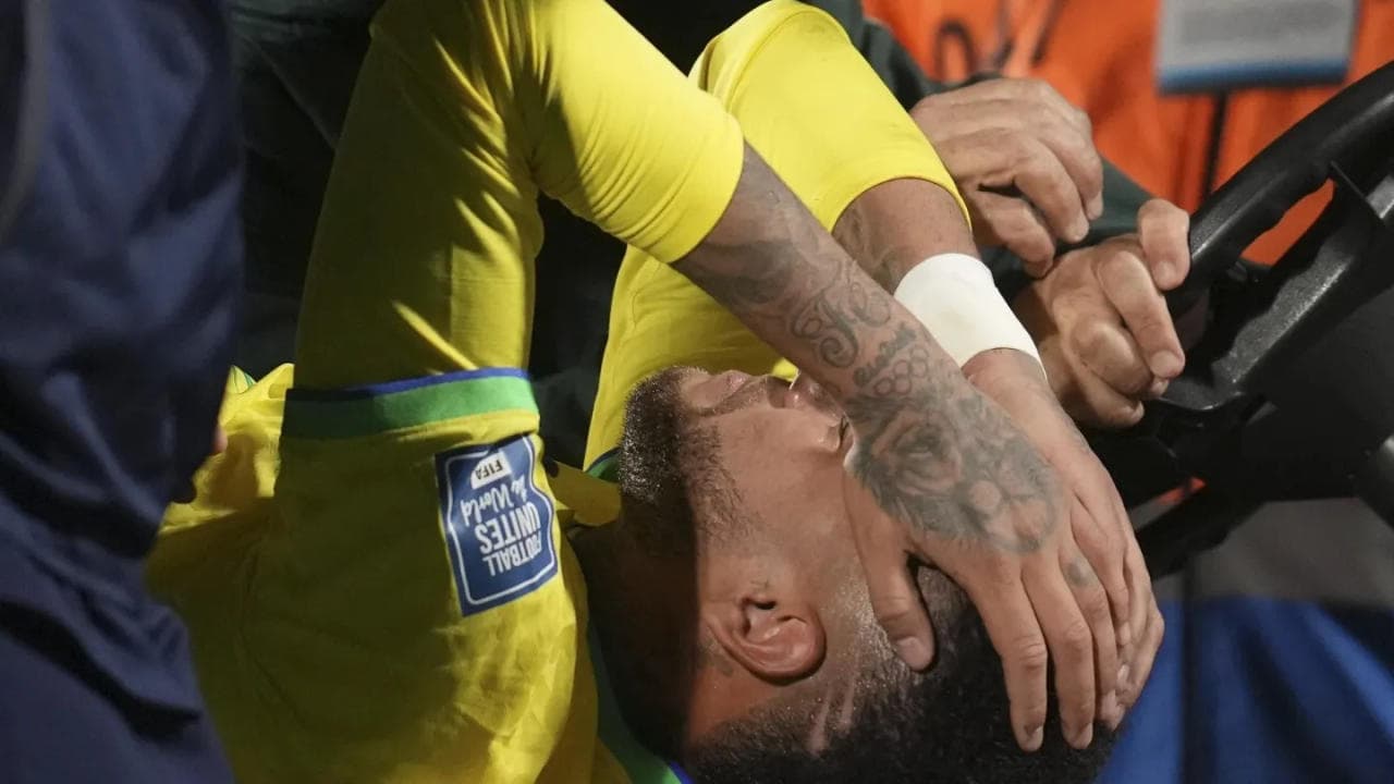 Neymar being carried off the pitch during a FIFA World Cup Qualifier match