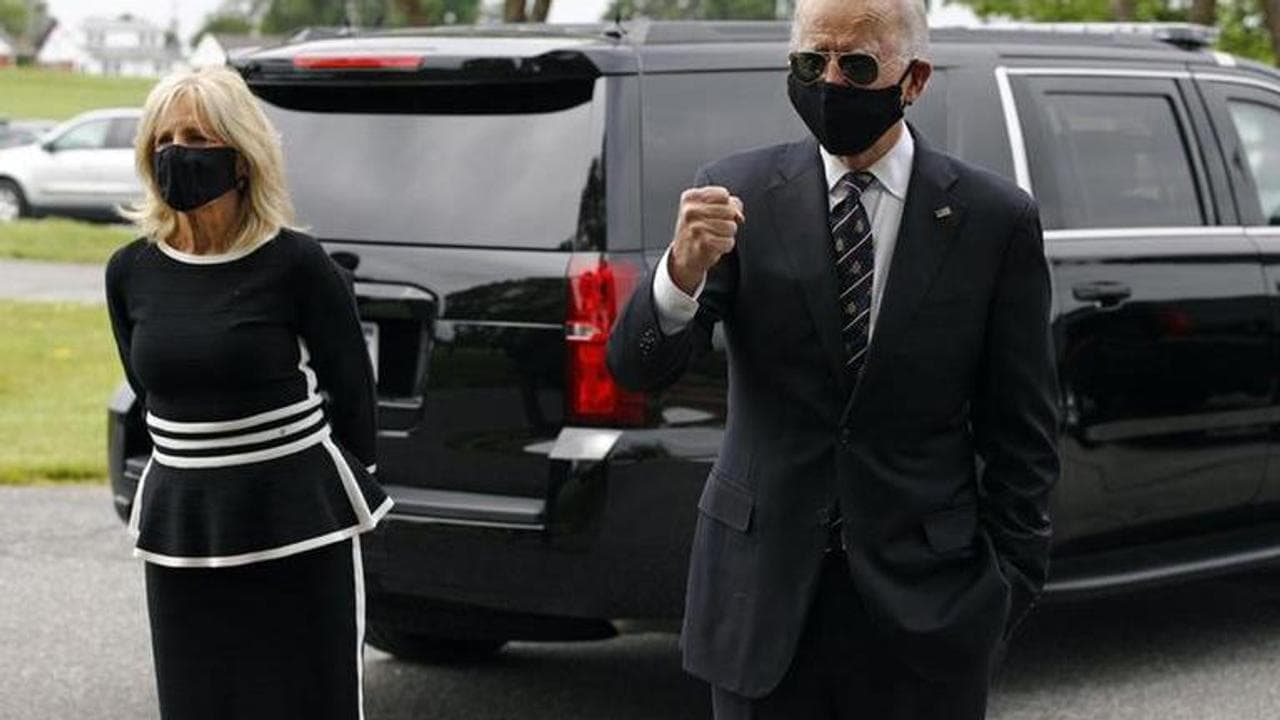 Biden says nation grieves for 100,000 US coronavirus victims