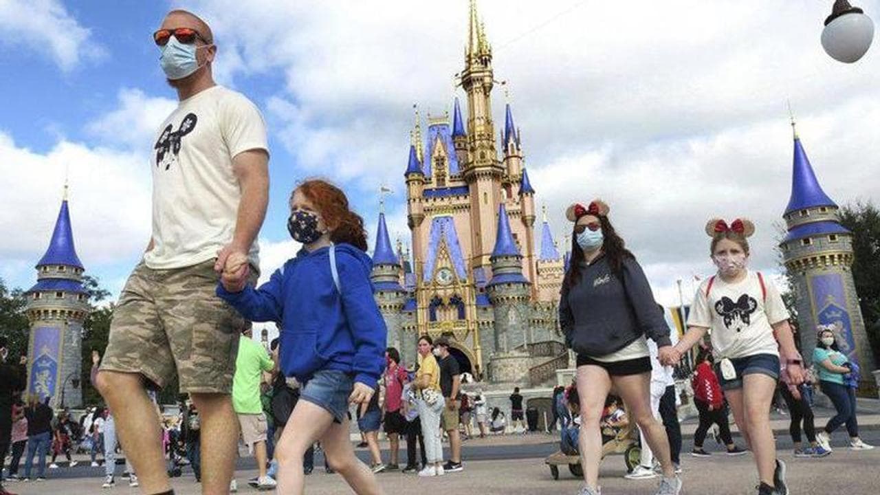 Man charged with spitting at Disney guard who asked for mask