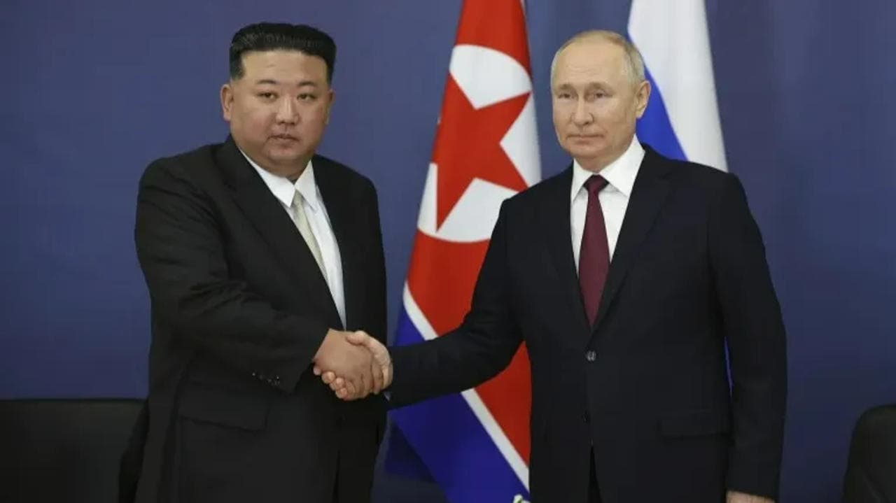 Russian President Vladimir Putin, right, and North Korea’s leader Kim Jong Un shake hands during their meeting at the Vostochny cosmodrome outside the city of Tsiolkovsky