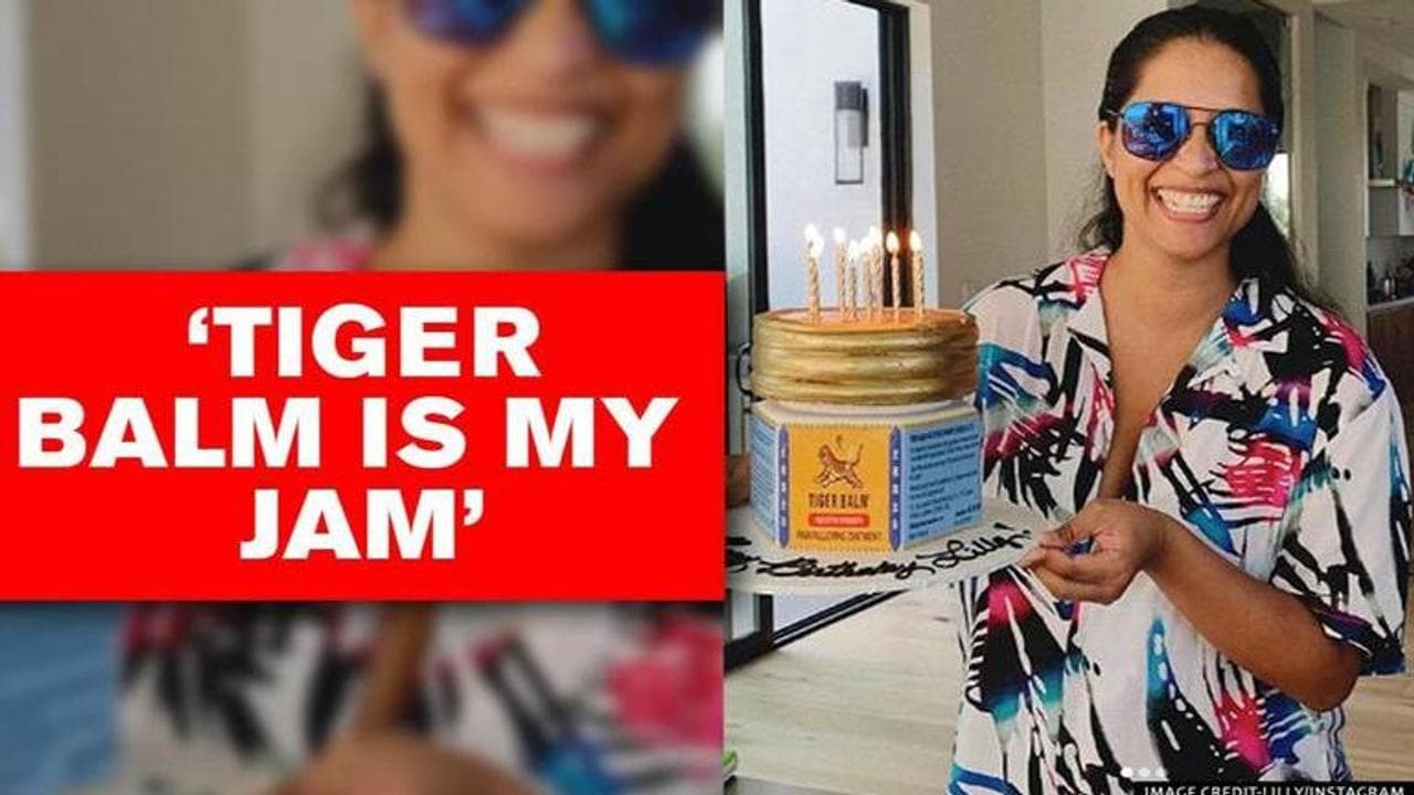 Lilly Singh receives Tiger Balm cake on birthday, says "it's totally me"