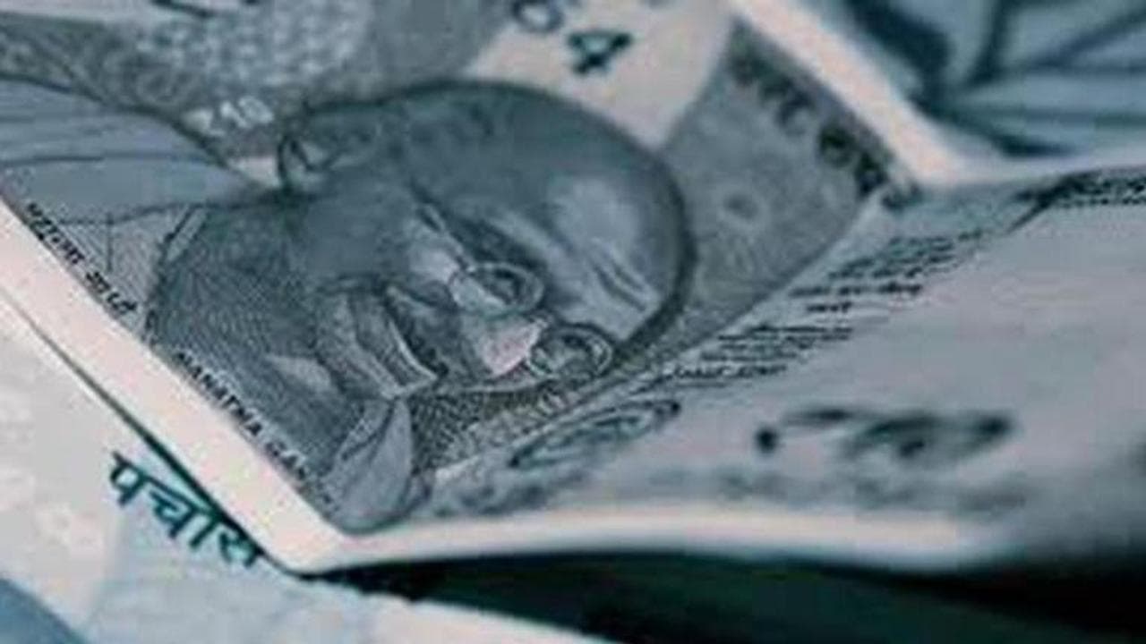 Rupee regains 11 paise against USD on easing crude