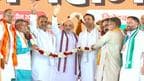 Union Home Minister Amit Shah with Muzzafarnagar candidate Sanjeev Balyan and RLD chief Jayant Choudhary during a rally 