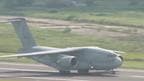 A Japanese military aircraft was forced to land after a window opened during a practice flight. 