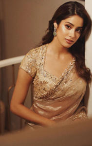  Here's another Janhvi Kapoor-inspired look in a golden saree with a stylish blouse.
