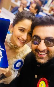 Alia Bhatt, who won the Best Actress award for Gangubai Kathiawadi, beamed with joy as she held the National Award souvenir and posed alongside husband Ranbir Kapoor. 