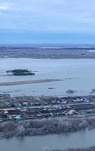 Nearly 14,500 homes have been submerged in the Russian region bordering Kazakhstan.