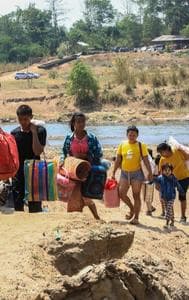 People fleeing Myawaddy township near the Myanmar-Thailand border.