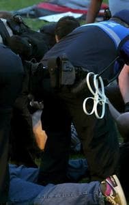 Police arresting pro-Palestine protestors at the Washington University campus. 