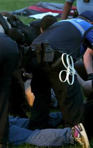 Police arresting pro-Palestine protestors at the Washington University campus. 