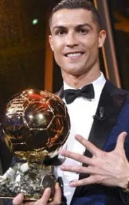 Lionel Messi and Cristiano Ronaldo with their Ballon d'Ors