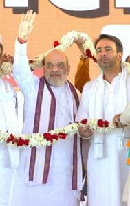 Union Home Minister Amit Shah with Muzzafarnagar candidate Sanjeev Balyan and RLD chief Jayant Choudhary during a rally 