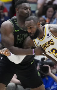 New Orleans Pelicans' Zion Williams and Los Angeles Lakers LeBron James in action