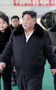 Kim Jong Un and daughter don matching outfits in visit to military production plant