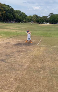 Australian toddler showing his batting