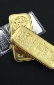 Gold and Silver prices slide