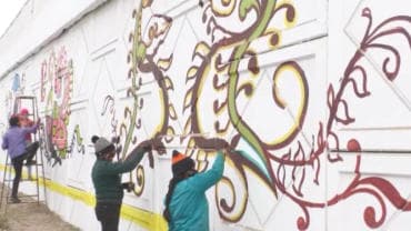 Students paint walls